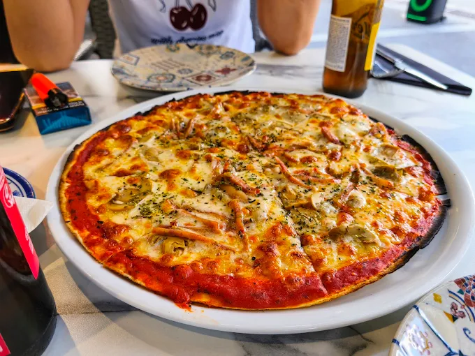 Pizza Rio amb pernil, bolets i orenga